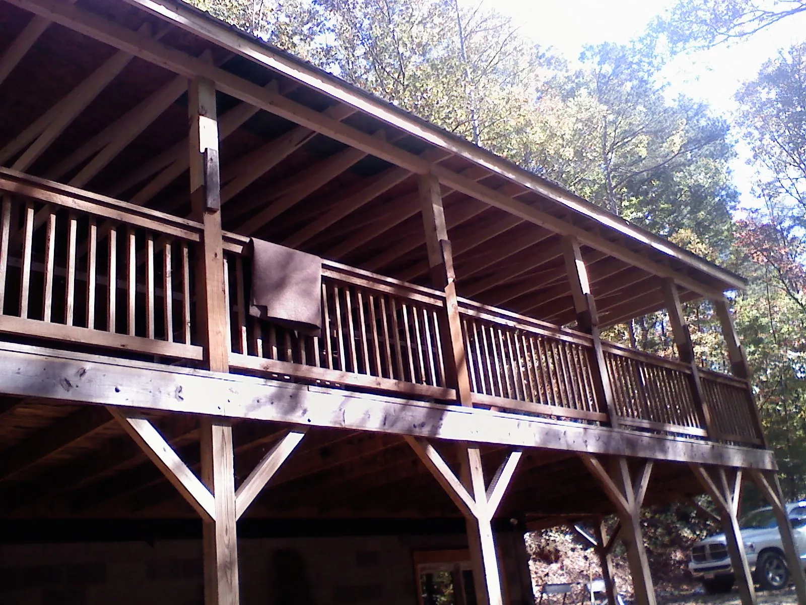 Timber framing under a new elevated porch and deck — Roof Leak Repair in Olivia by Roofing Brothers